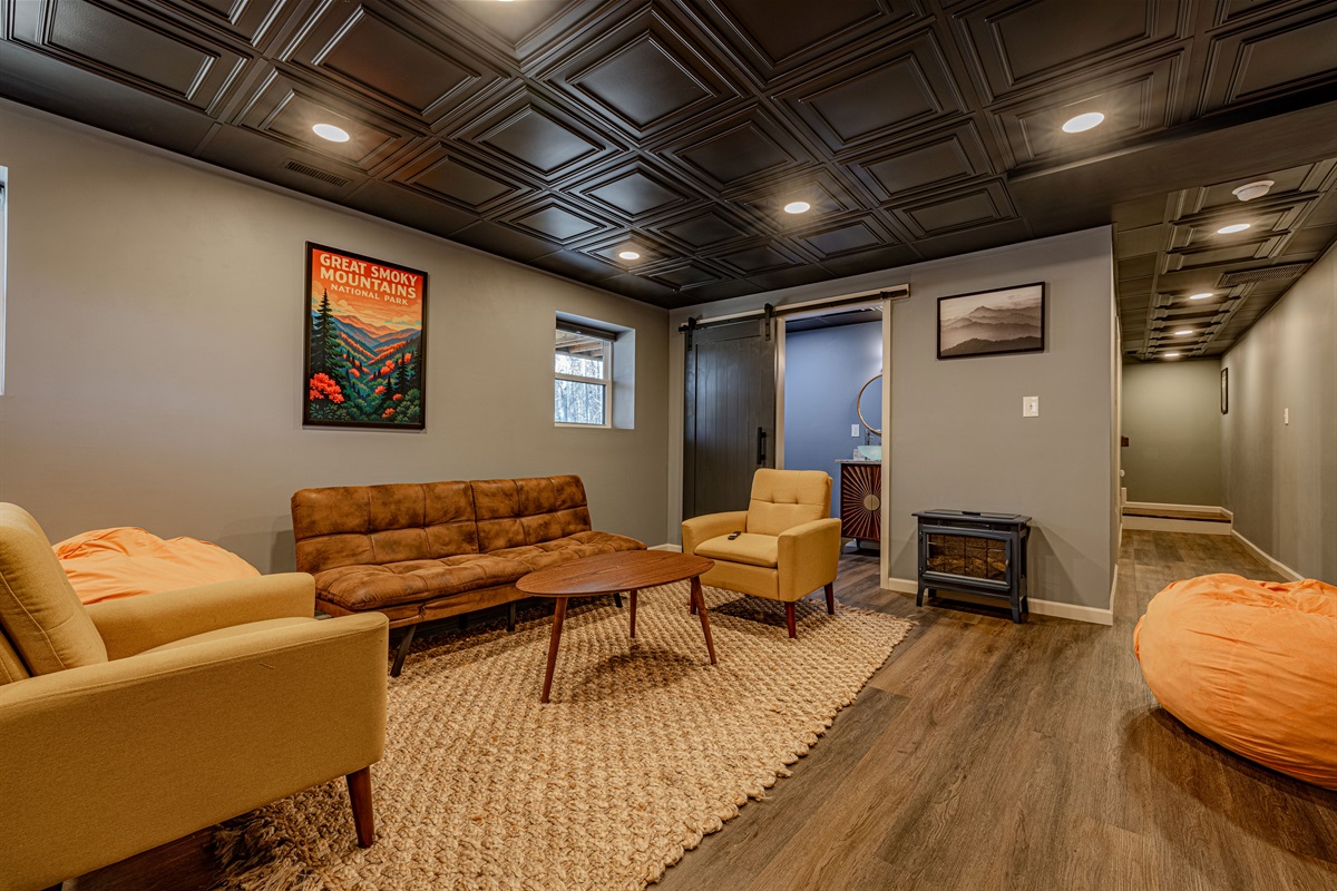 Gather the family for board games or a blockbuster movie. With its spacious layout and trendy decor, this room is the heart of indoor mountain fun.
