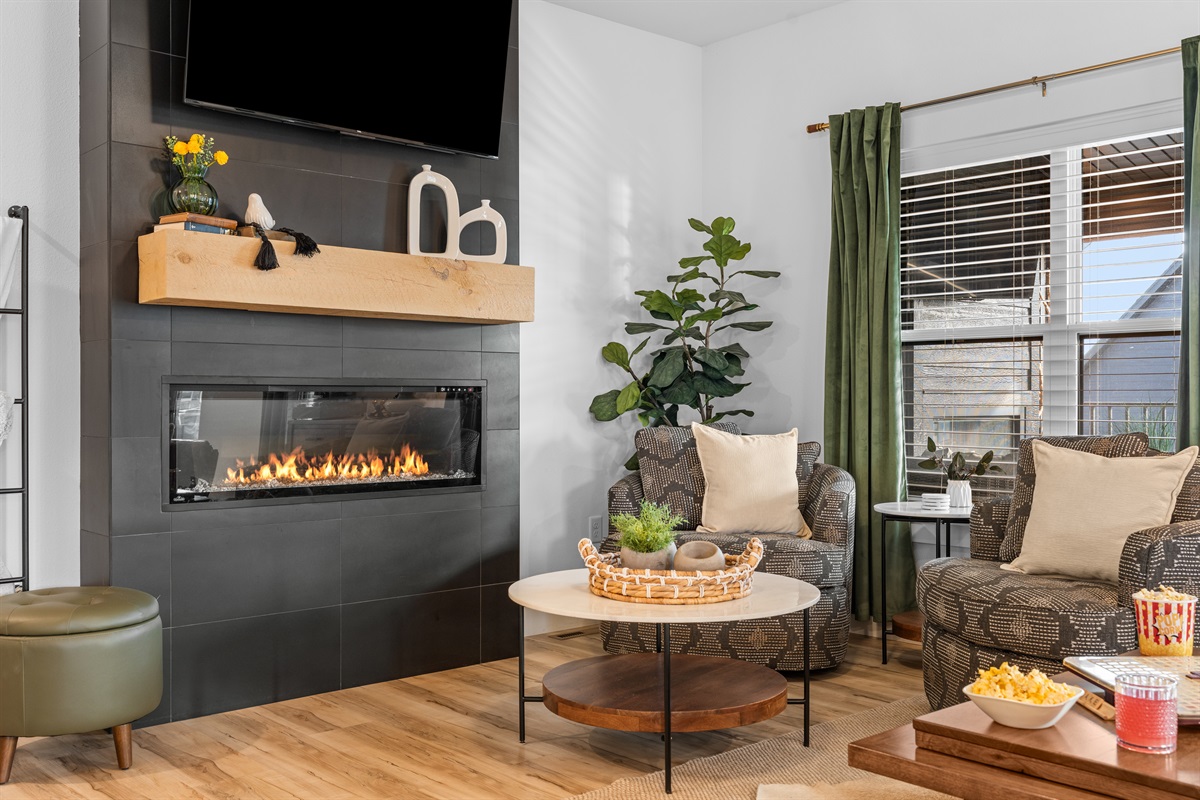 Enjoy a beautiful electric fireplace to relax while you play games or watch a movie