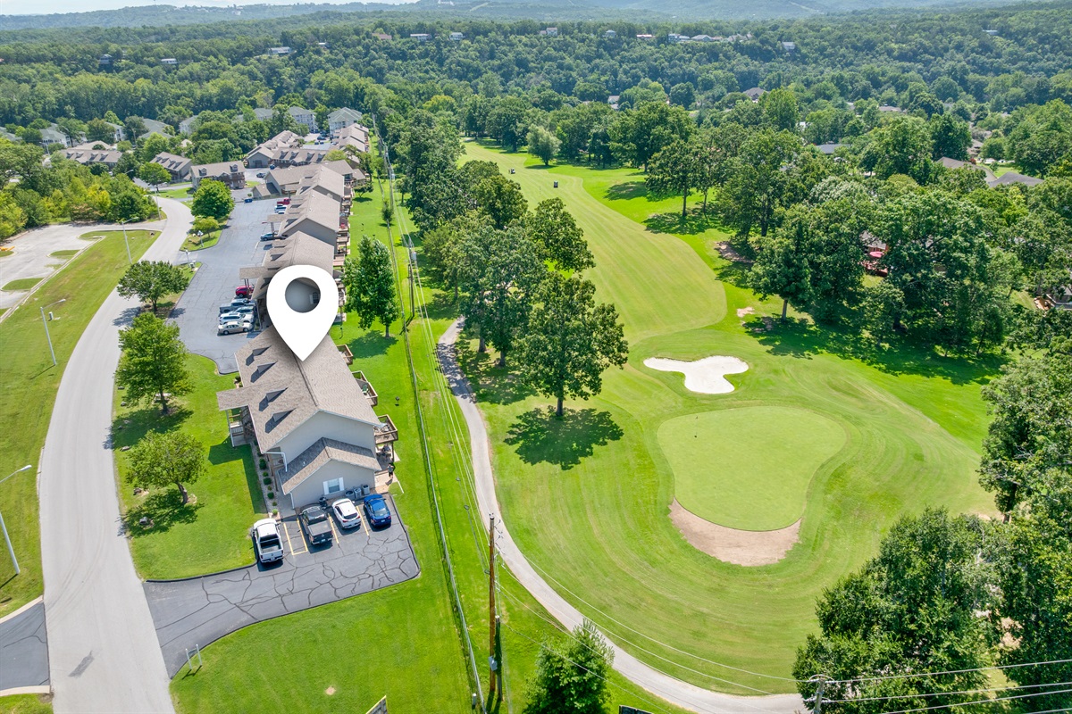 Your Branson getaway—ground-floor condo with front-row views of Pointe Royale’s 7th hole.