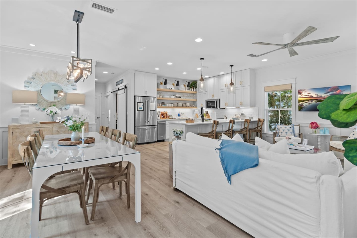 Open concept dining room, living room with fully stocked kitchen & coffee bar