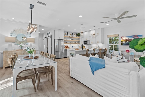 Open concept dining room, living room with fully stocked kitchen & coffee bar