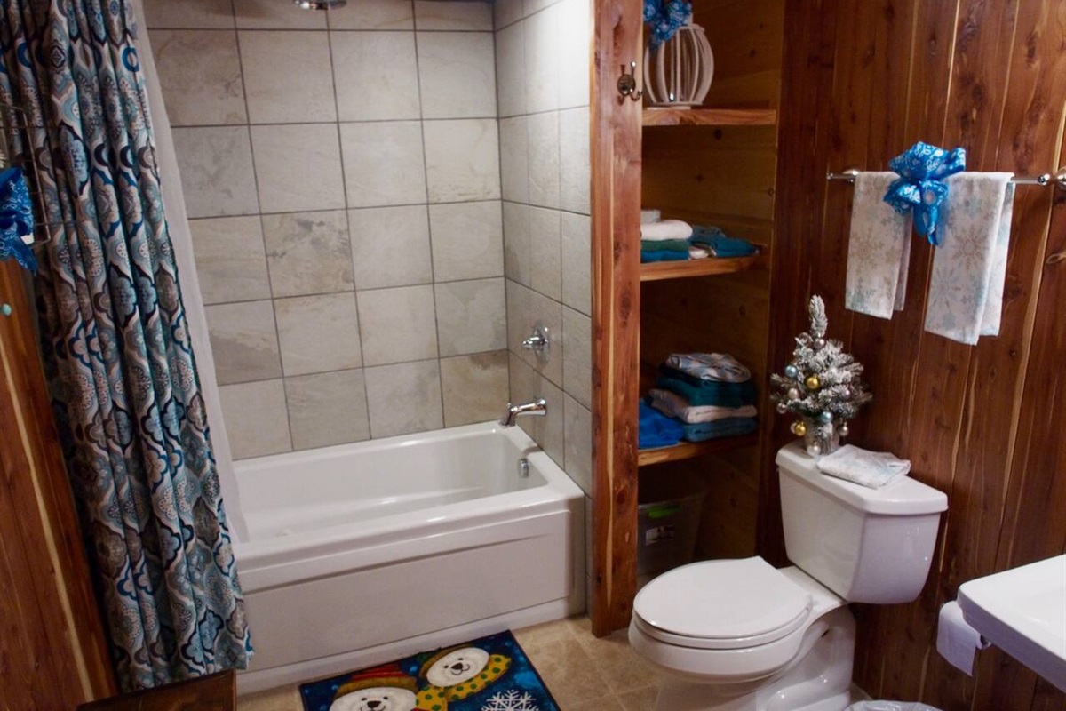 Beautiful Bathroom with Jetted Tub and Rainforest Shower