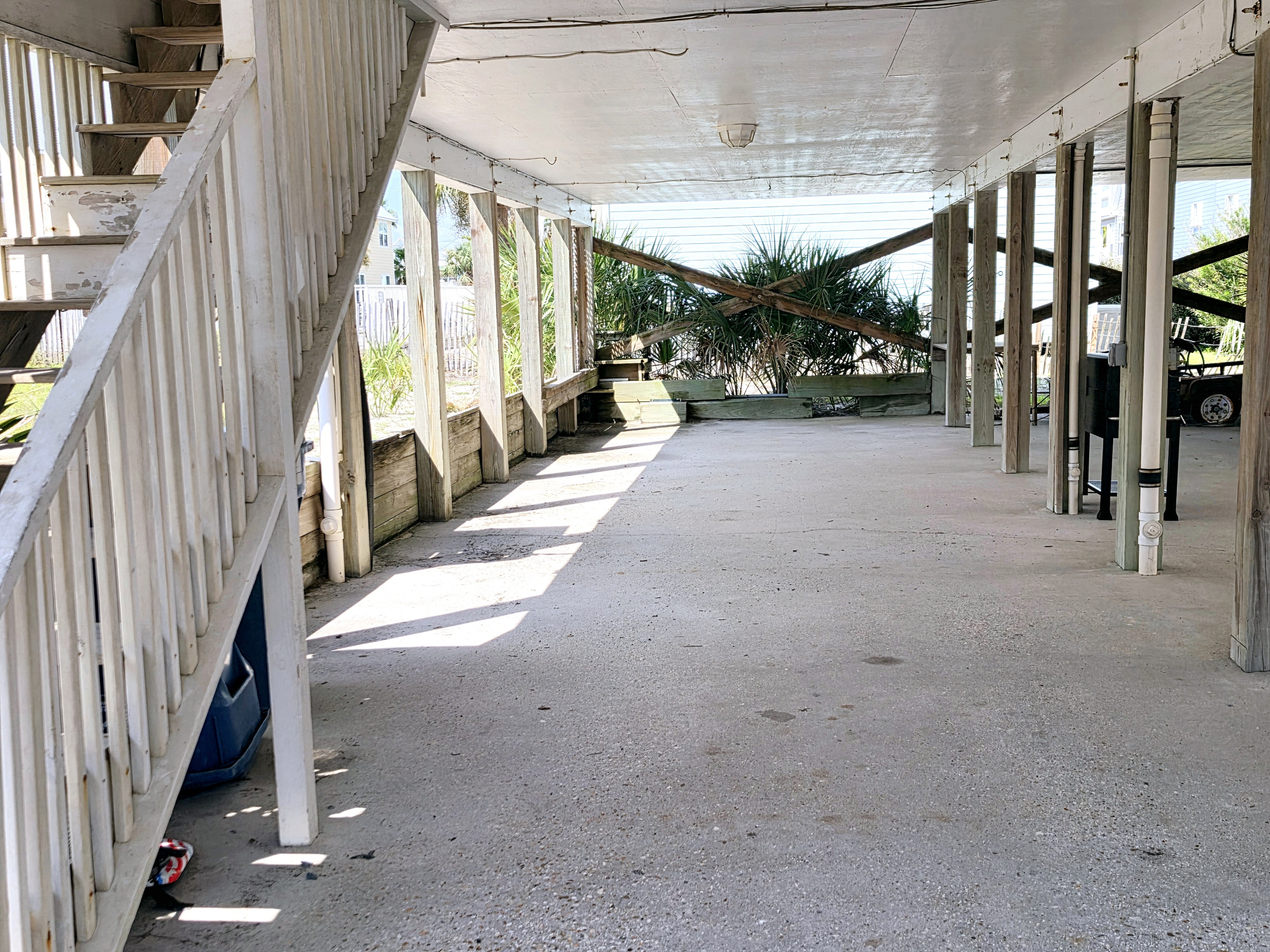 Covered parking beneath the home