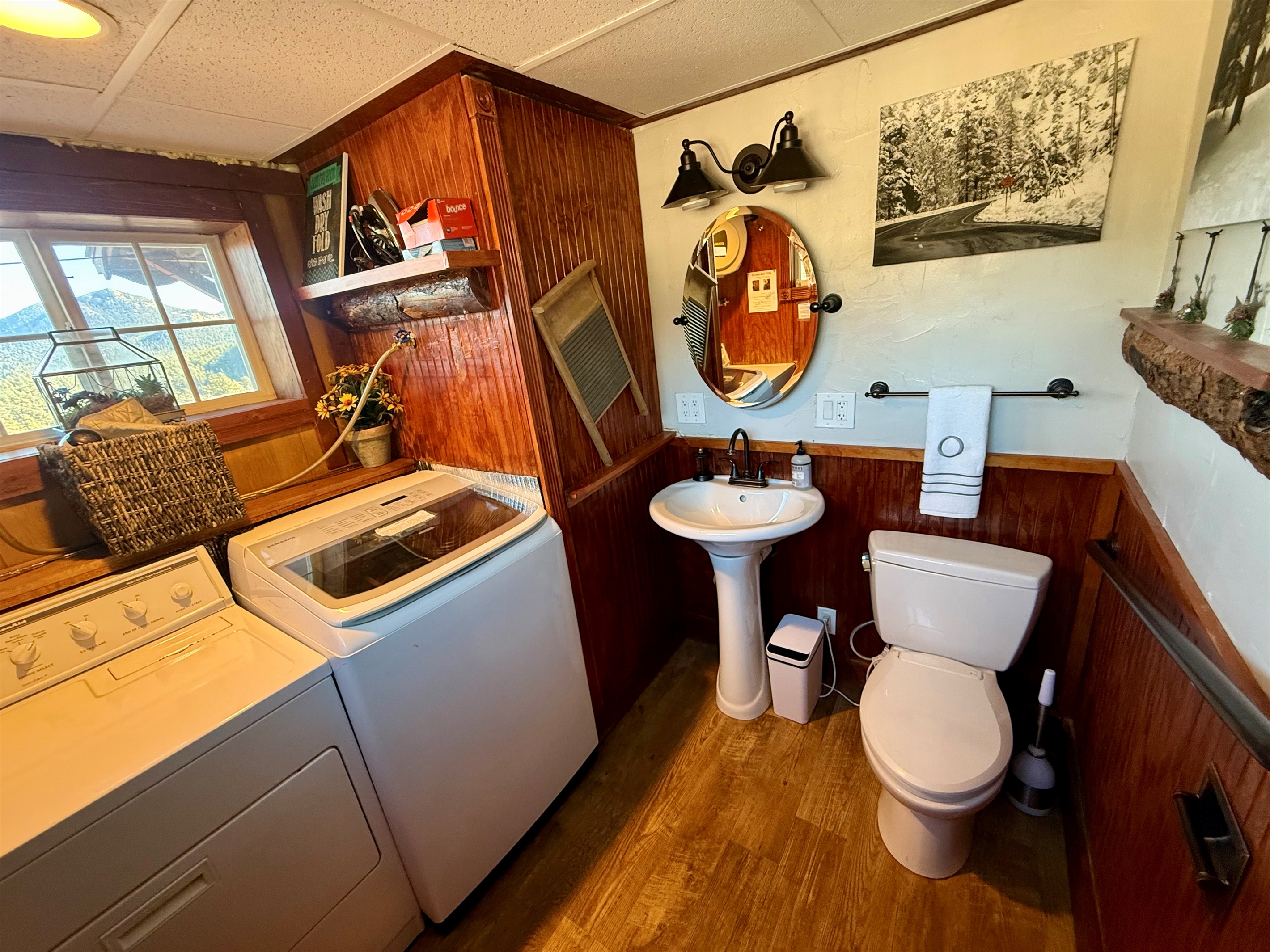 Convenient laundry area with washer/dryer and a half bath — perfect for longer stays and family trips.