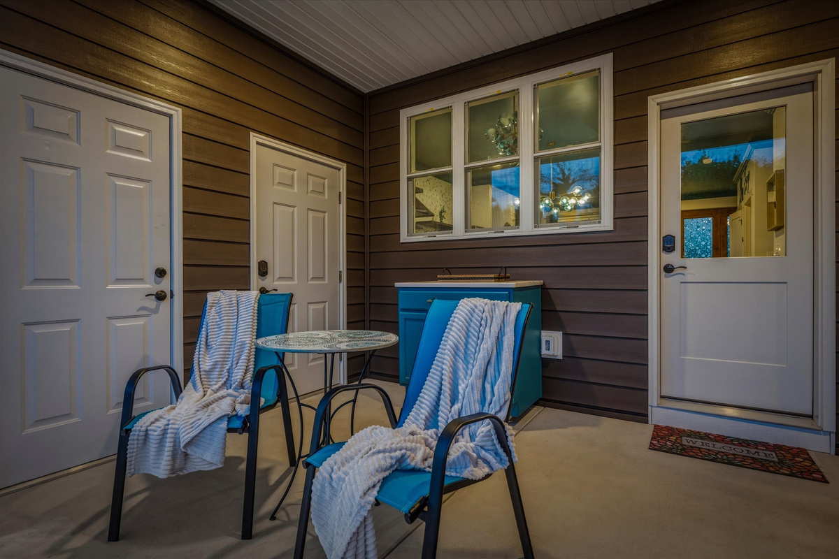 The covered porch extends your living space outdoors and offers a wonderful place to relax.
