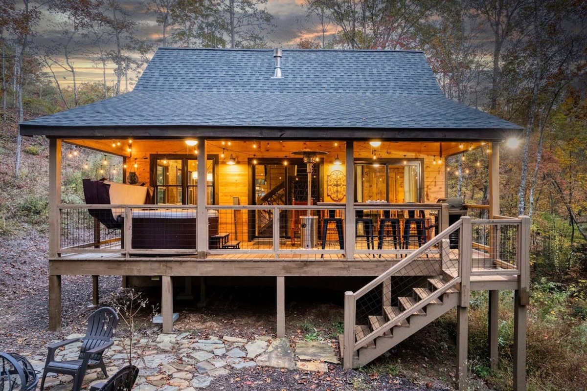  Our cabin's exterior radiates rustic charm, a serene retreat amidst wilderness.