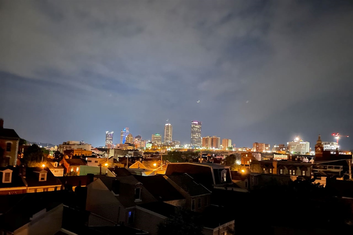 Stunning night view of the neighborhood, with city lights and a peaceful ambiance that adds a touch of serenity to your stay.