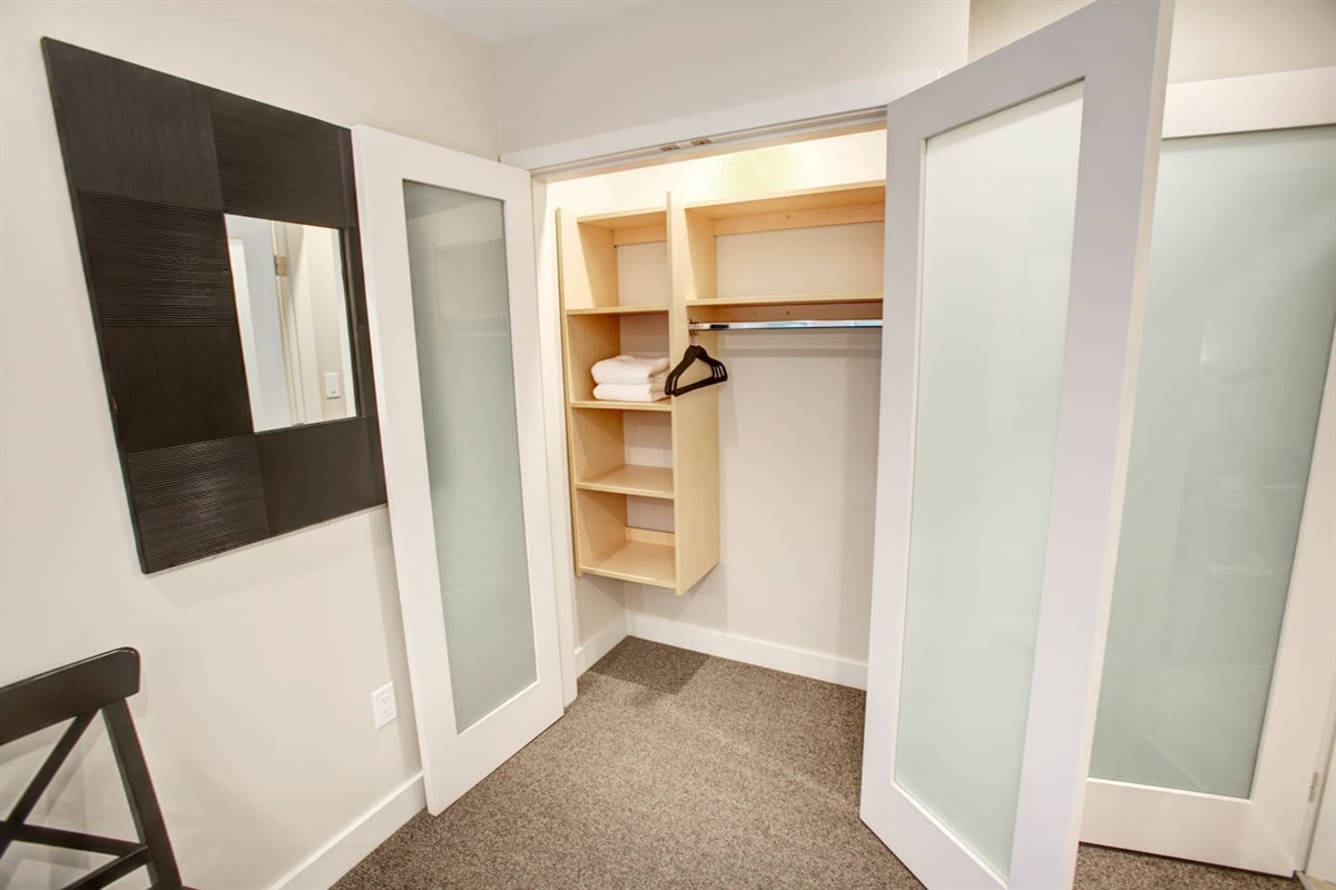 All bedroom closets have built-in organizers and motion detection lighting
