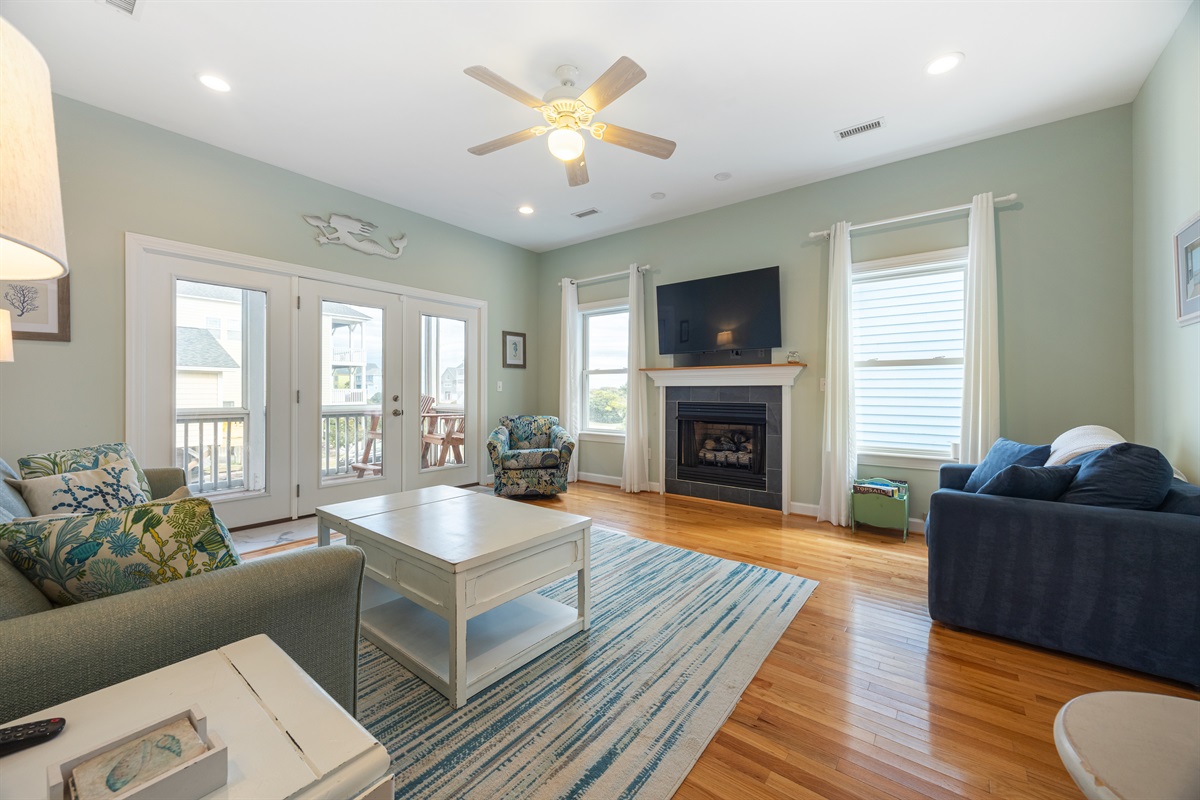 Bright, open coastal living room perfect for lounging after a beach day