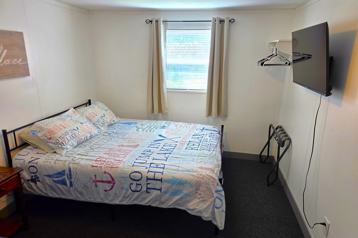 Bedroom 1 - has a queen & twin bed plus a TV.