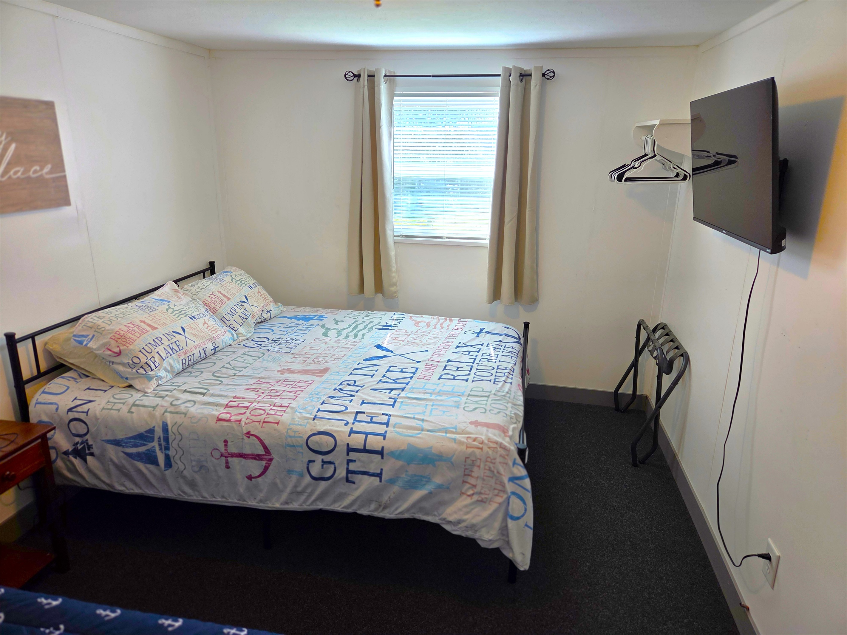 Bedroom 1 - has a queen & twin bed plus a TV.