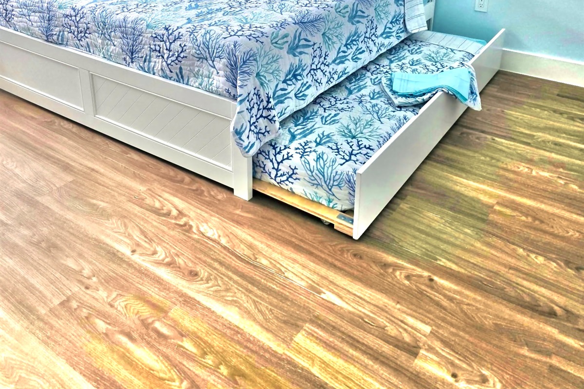 The master bedroom offers a twin trundle bed.