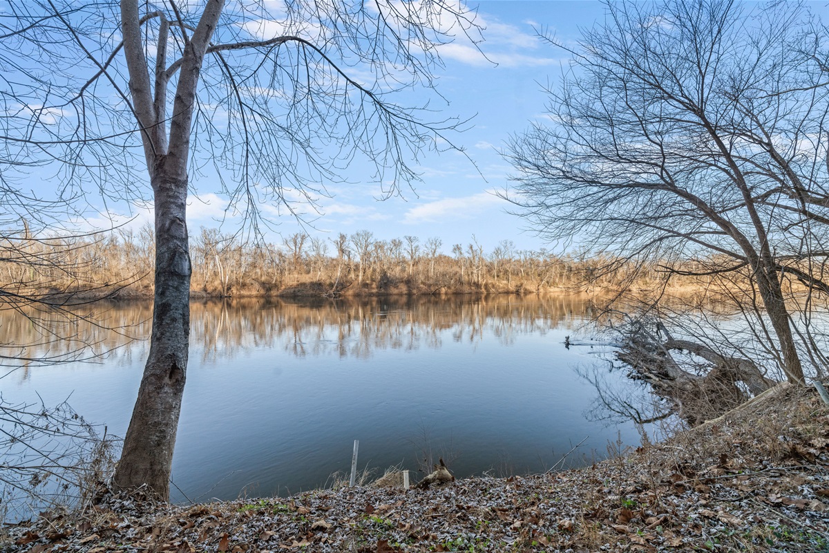 Riverside Retreat: Breathe in serenity while enjoying stunning river views from your own backyard!