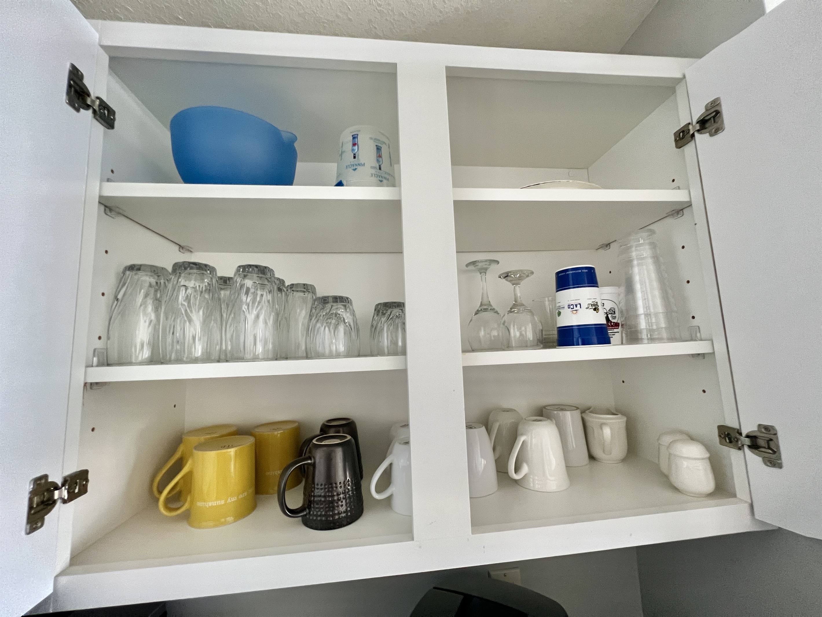 Fully stocked with pots, pans, dishes, silverware and glasses!