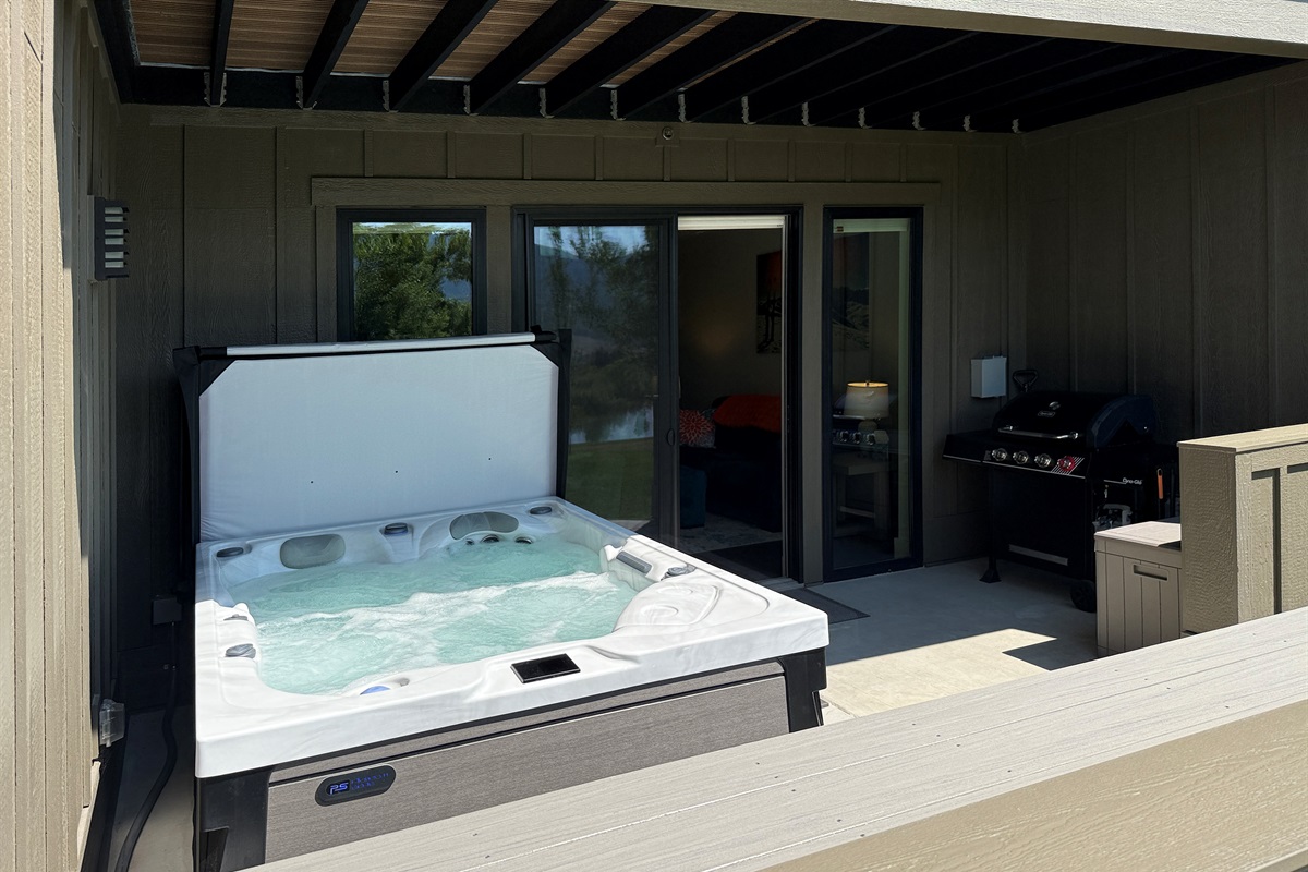 Relax  with family and friends on the partially covered deck, just outside the main living area.