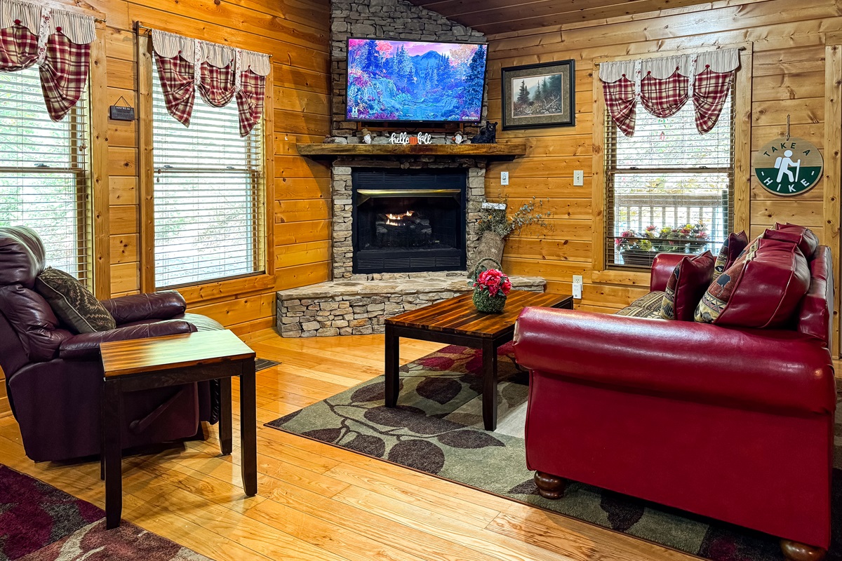 Cozy up by the stone fireplace. The perfect spot to relax and defrost after a day of hiking in the National Park