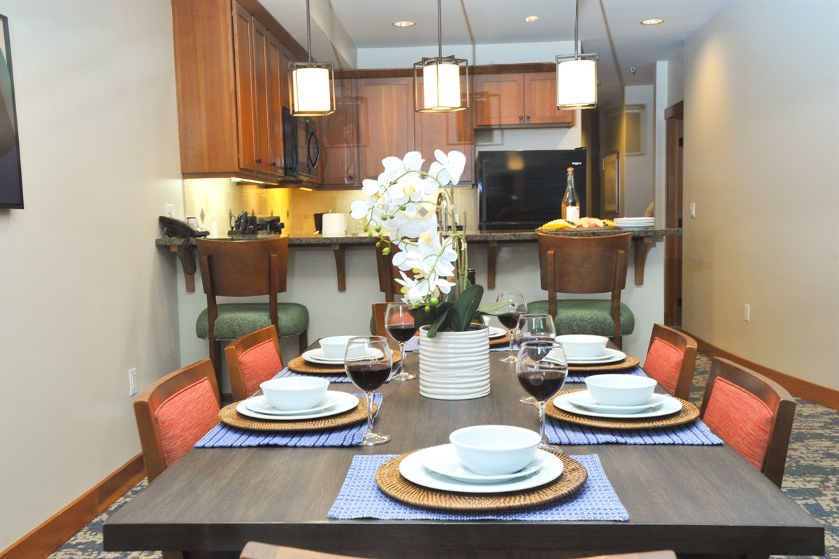 Bar area and open dining room. Dining table seats 6, bar area seats 3