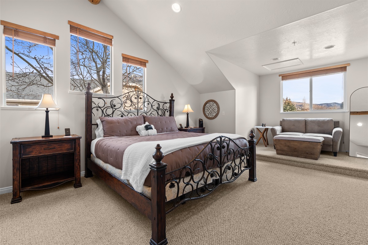Retreat upstairs to a serene primary bedroom designed for deep rest and total relaxation.