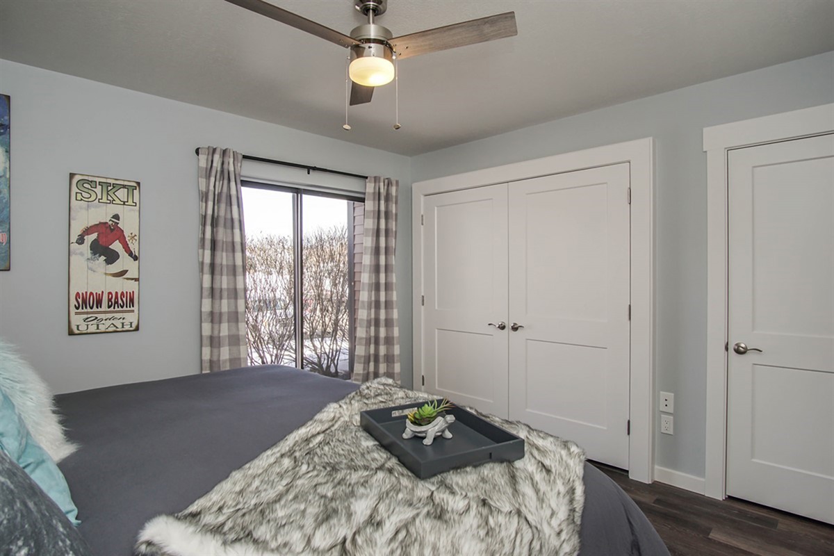 Comfortable bedroom with mountain views and plenty of natural light.