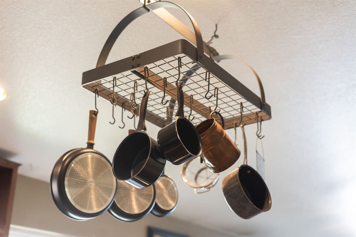 A fully stocked hanging pot rack means you'll have the right cookware for every dish — no need to pack a thing.