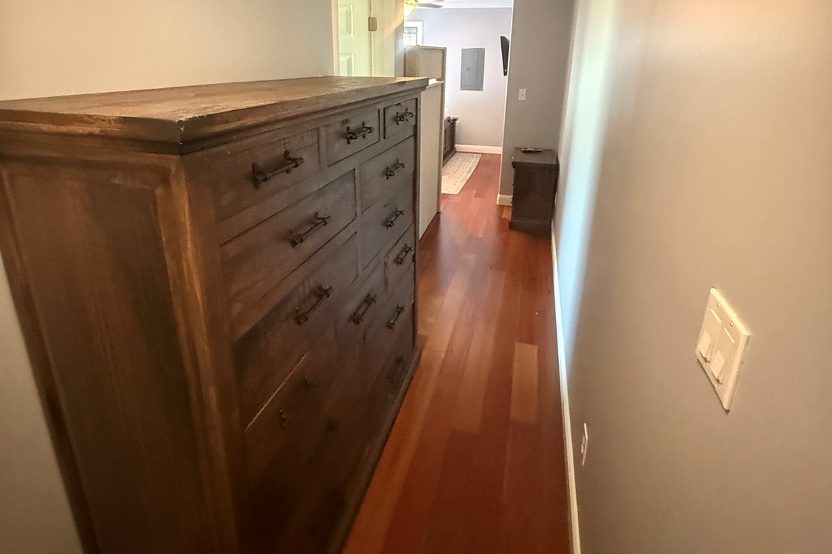 Entrance to Bedroom 3 with a large top-quality dresser with plenty of room for clothes