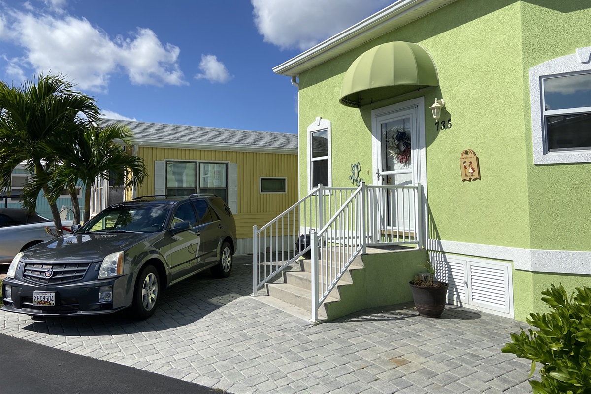 Parking for 2 medium cars. Trucks/large SUVs are parked at the overflow lot.