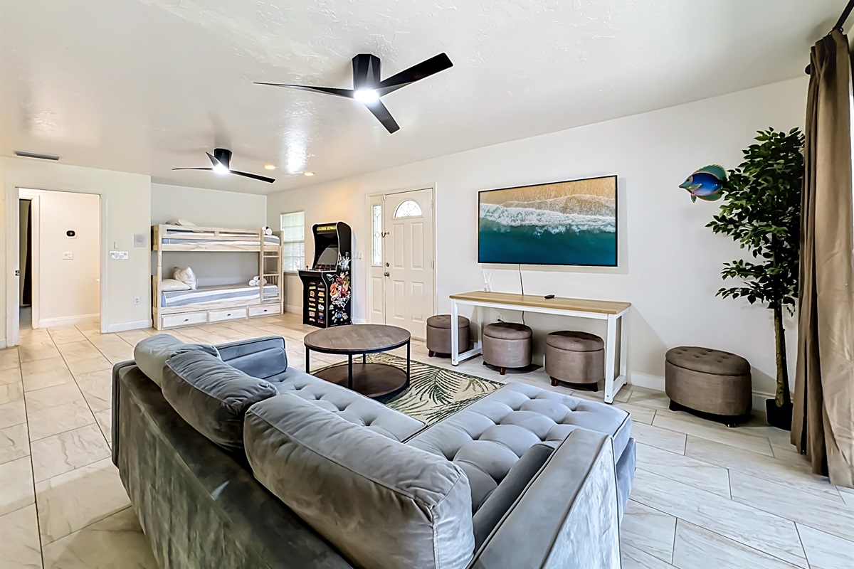 Our game room, also doubling as our fifth bedroom, with an arcade and a foosball table. 