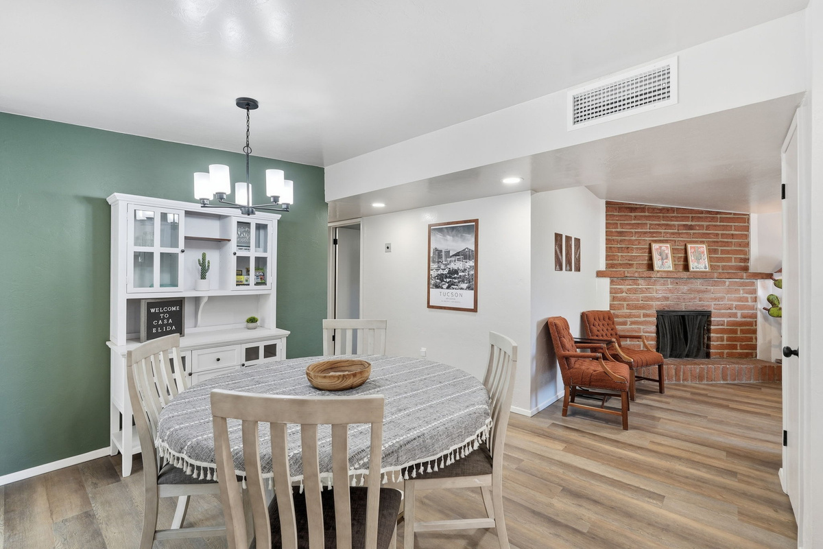 Gather & Dine: Cozy dining table with seating for four, perfect for home-cooked meals or takeout.
