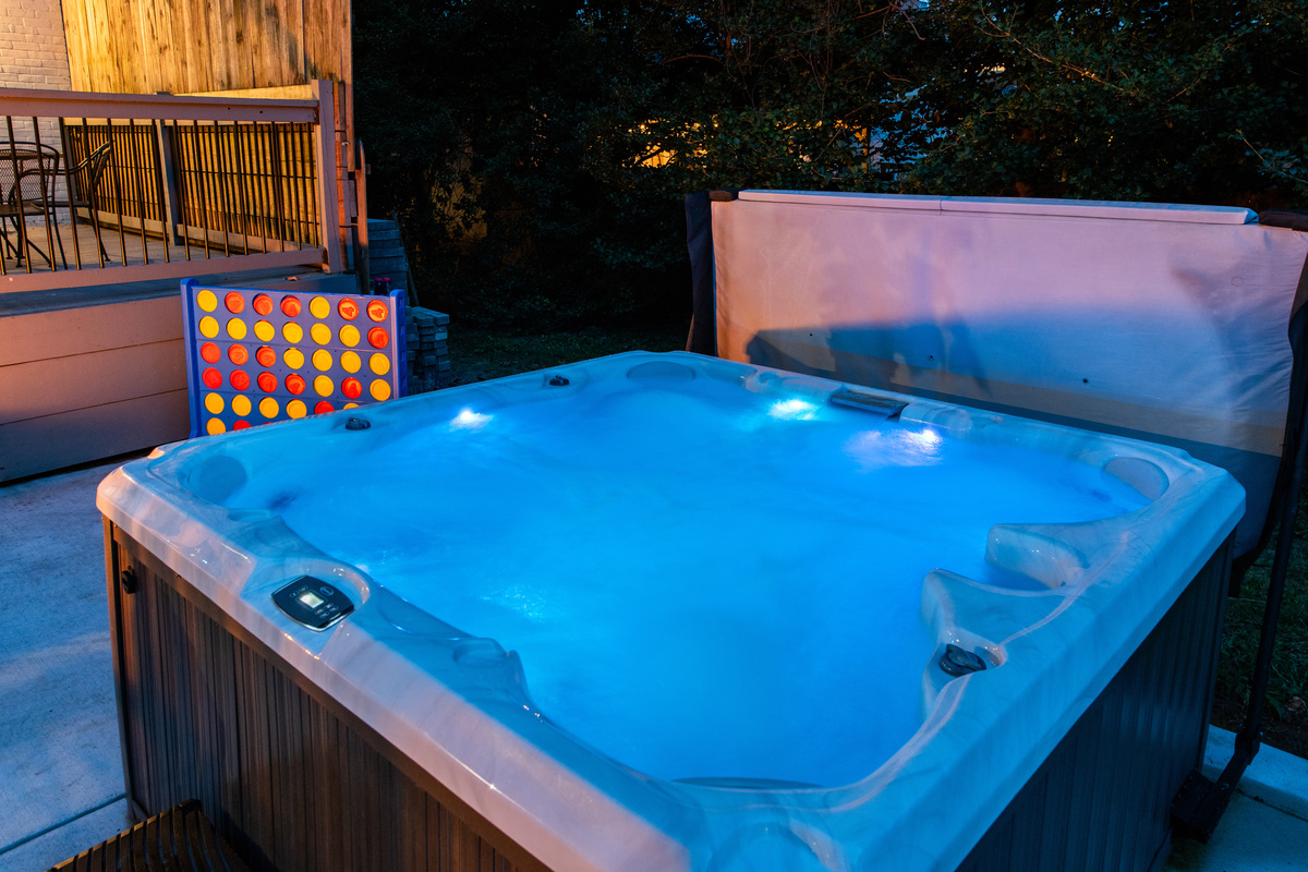 Hot tub, fire pit and back deck area