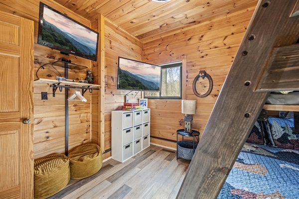 Please note, this room has been updated and now features one large Smart TV and twin/queen bunk bed.  This allows for a more comfortable queen bed configuration where boths sides of queen bed are accessible for guests to get in and out of more easily.
