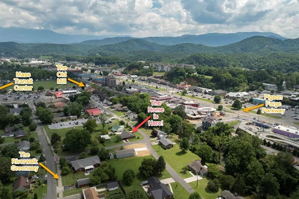 Overhead view of our home perfectly situated in the heart of Pigeon Forge. This aerial shot highlights our prime location just steps from the Old Mill District, Riverwalk Greenway, the Parkway, the Mass Transit Center and much, much more!