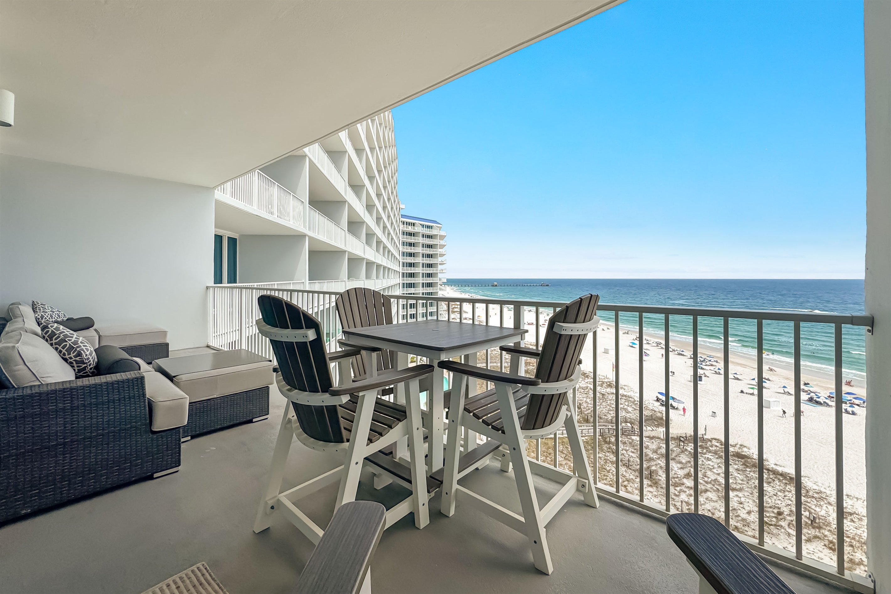 Where the sky meets the sea.  This expansive balcony provides a front-row seat to nature's most spectacular show.  Unwind and recharge in this idyllic setting.