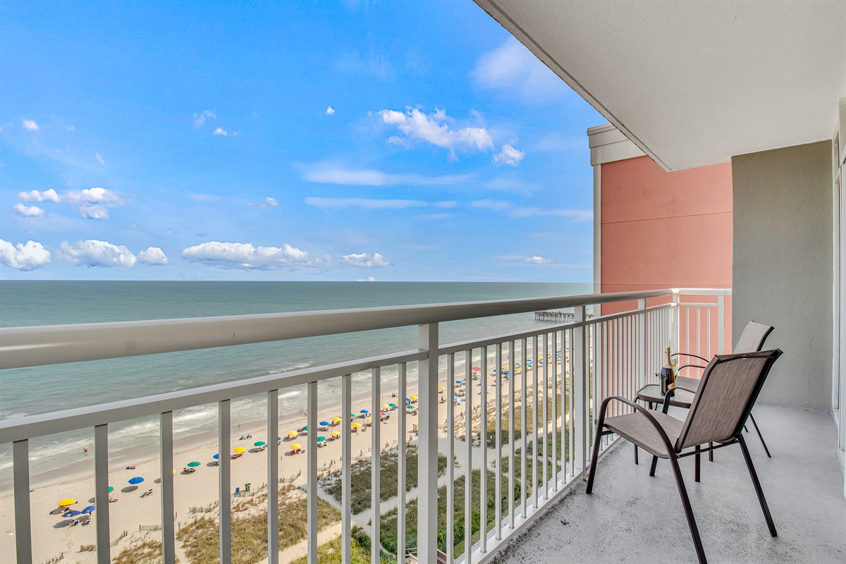 Sip your morning coffee with panoramic views in this balcony!