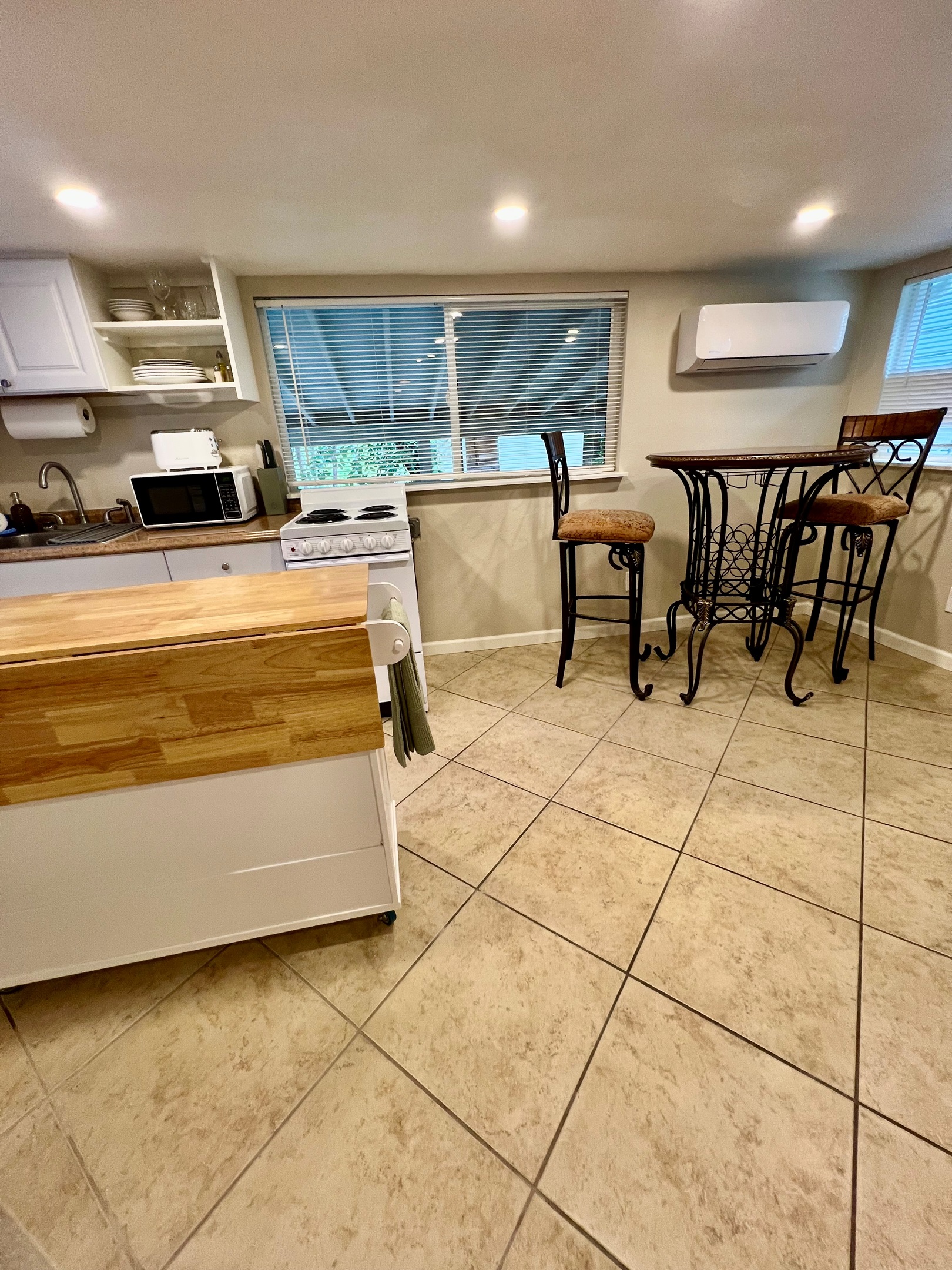 Stay comfortable year-round with private A/C, a fully equipped kitchenette, and your own dedicated dining space.