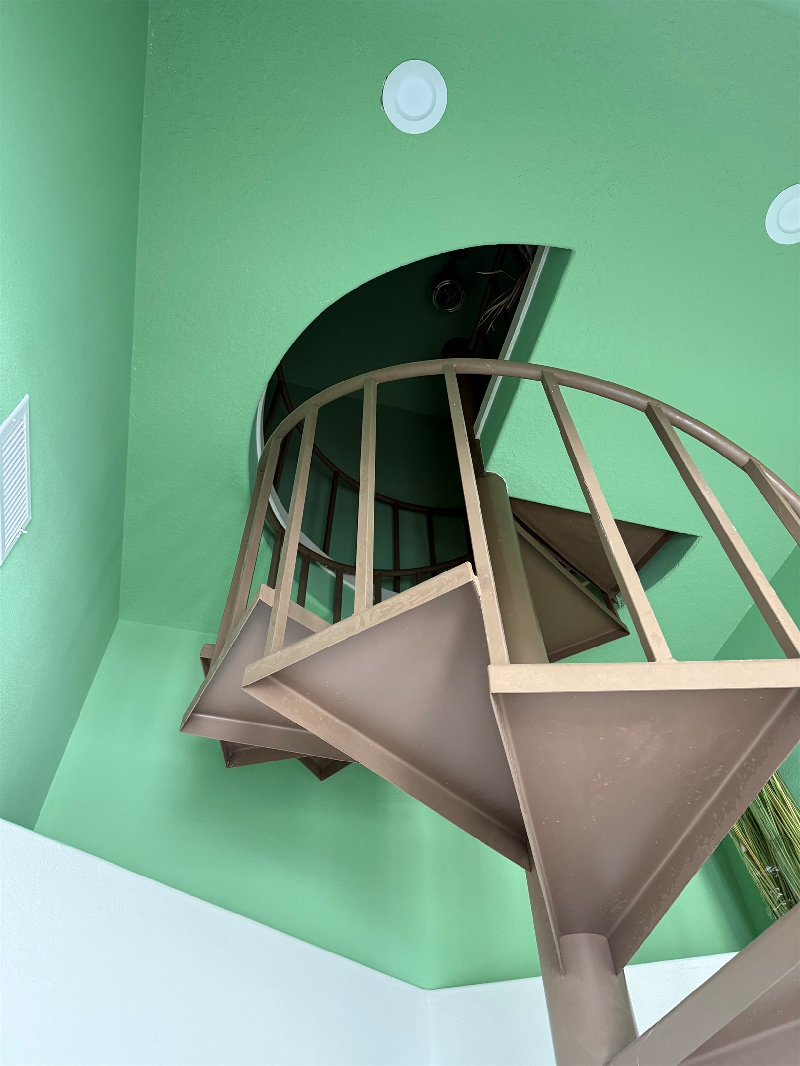 The indoor spiral staircase leads to the Best Lookout in all of Galveston 