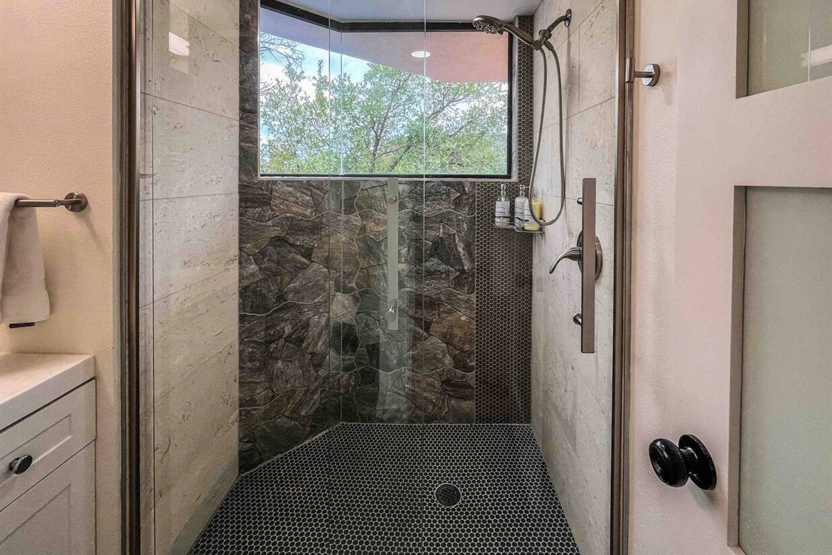 Brand new bathroom with barnyard style 
 shower door 