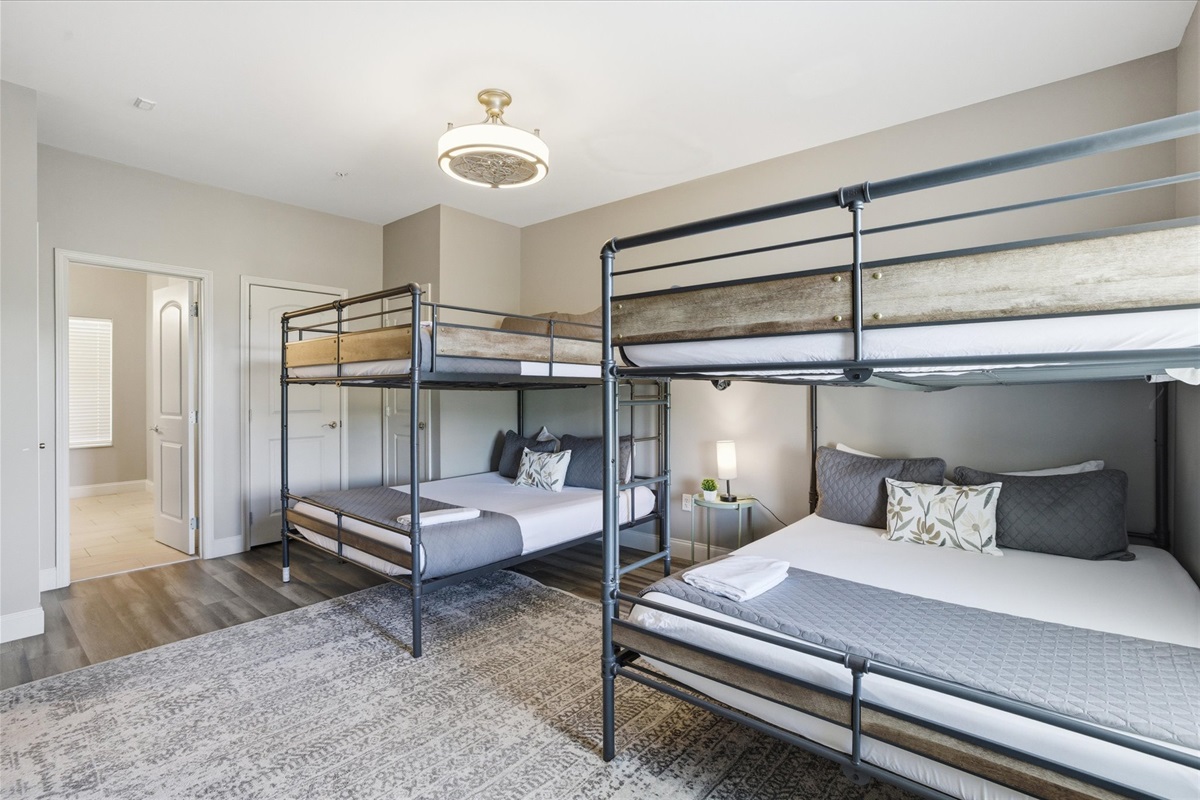 Wake up slow here—natural light, quiet mornings, and just enough space to move without stepping on each other. Whether you’re getting ready for the day or lingering a little longer, this bunk room keeps things easy and comfortable.