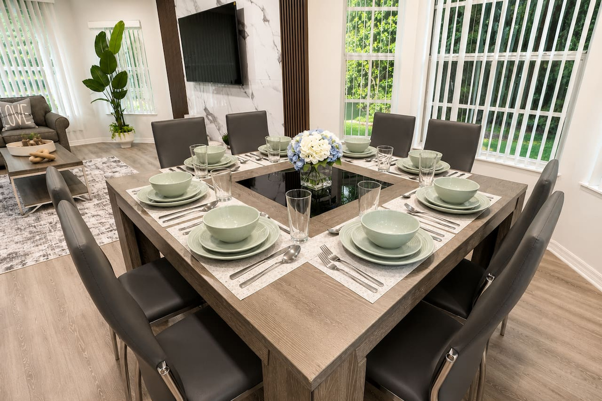 Dining table set for 8, ideal for shared meals and family gatherings.