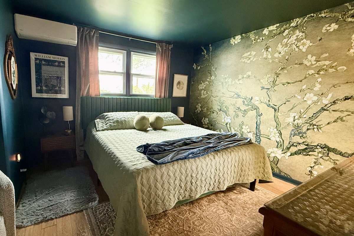 The King bedroom features its own heating/cooling unit, and that beautiful Van Gogh wall
