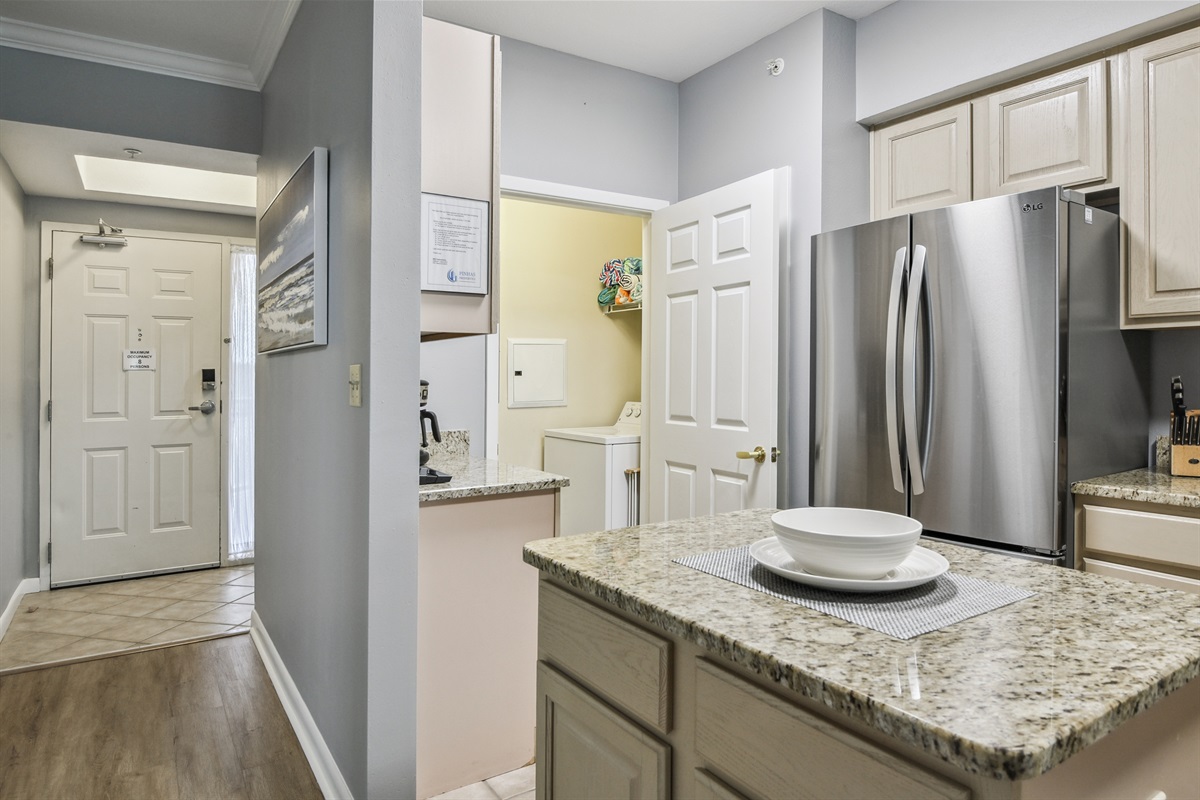 Kitchen looking into laundry room.