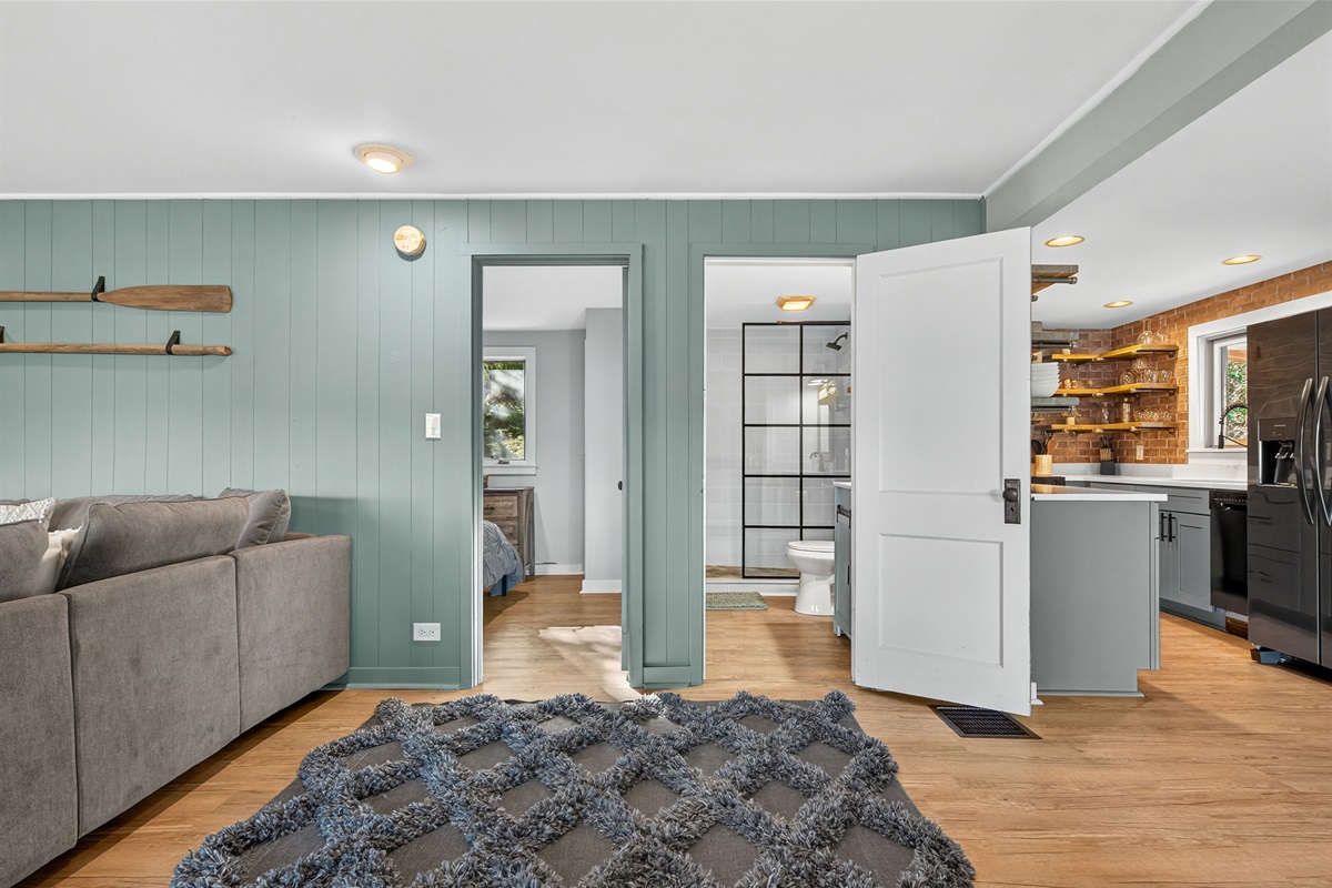 Hallway connecting the living room to the bedroom and bathroom.