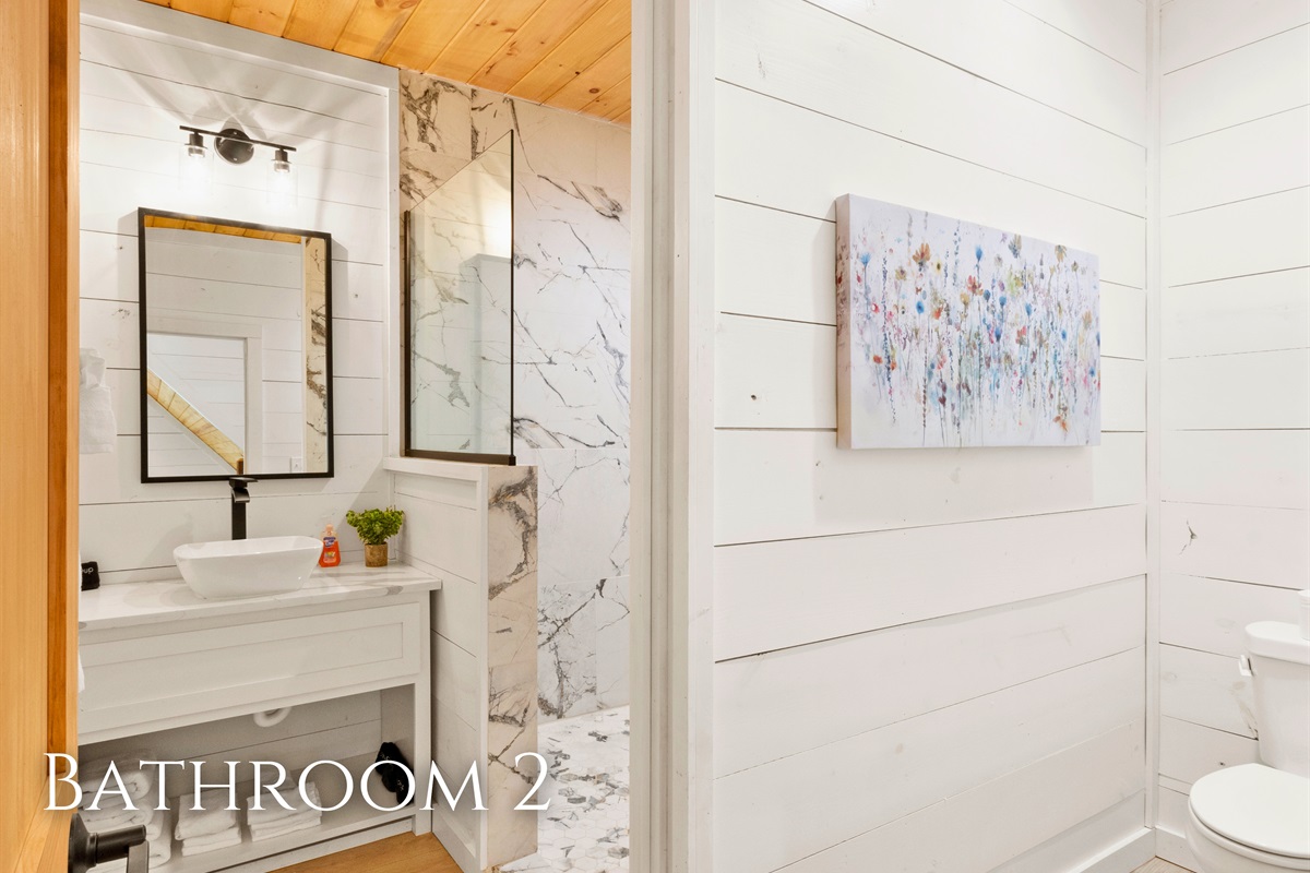 Spa-like serenity! Our bathroom is a modern retreat for those relaxation moments.