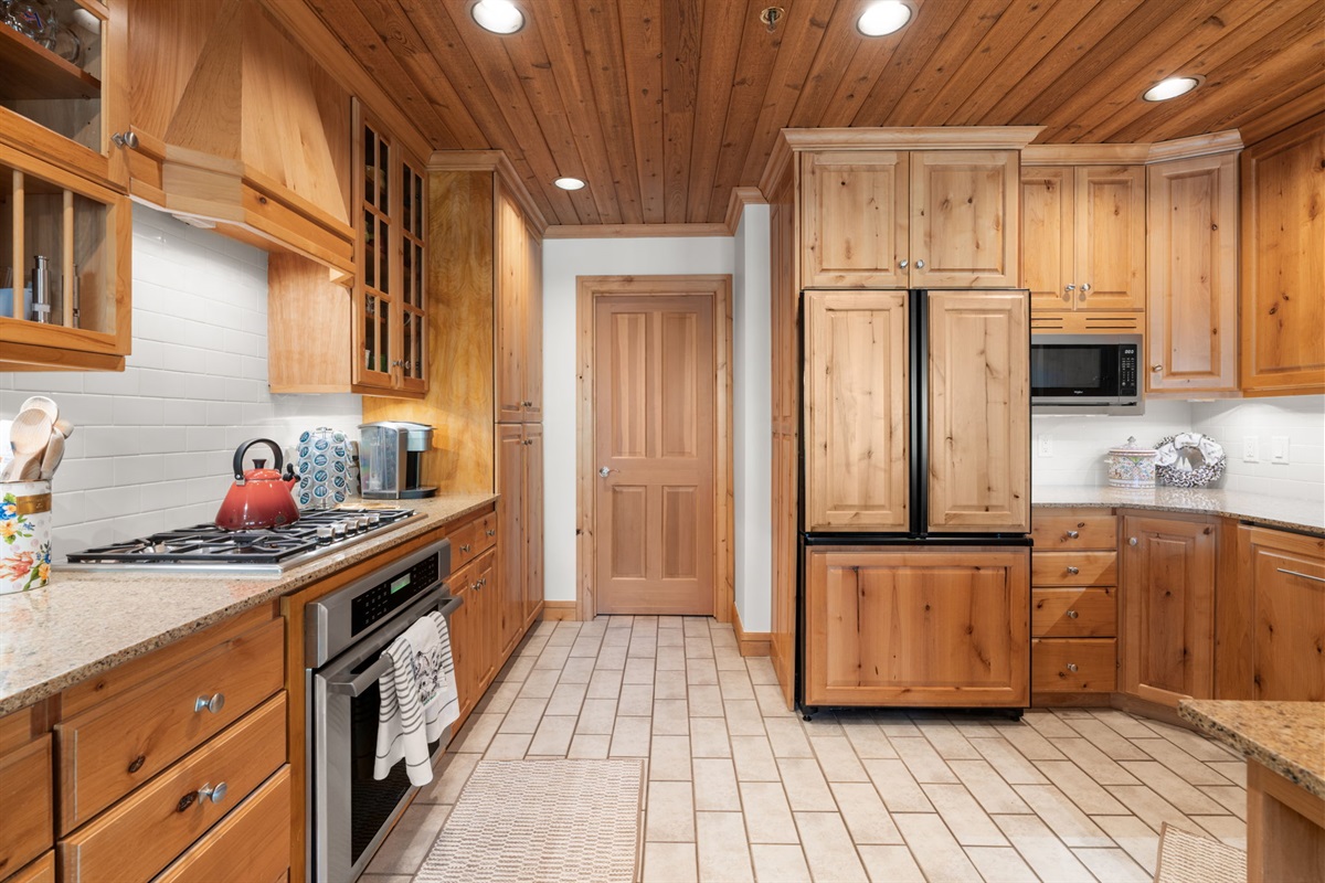 Large Kitchen leading to full laundry room
