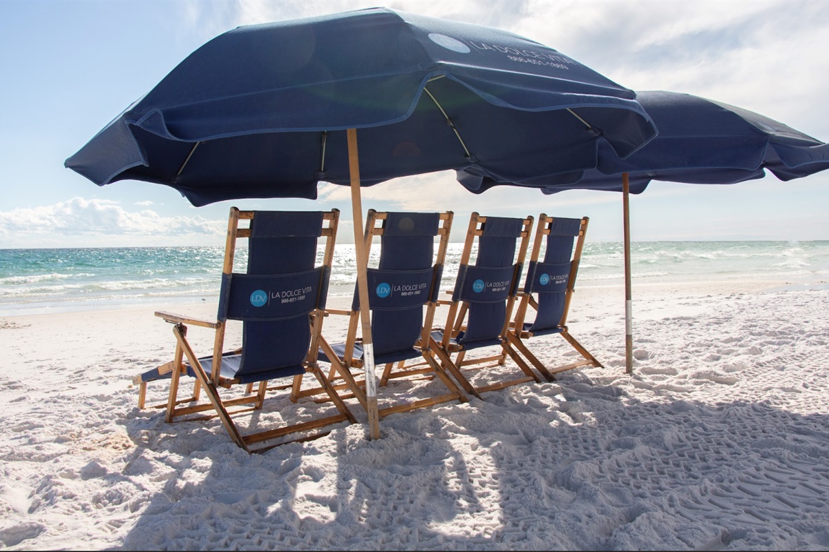 FREE Beach Chair Service: 4 Chairs & 2 Umbrellas (in-season March 1-October 31) are setup right in front of the home for you to enjoy! Our provided beach gear can be setup around these chairs.