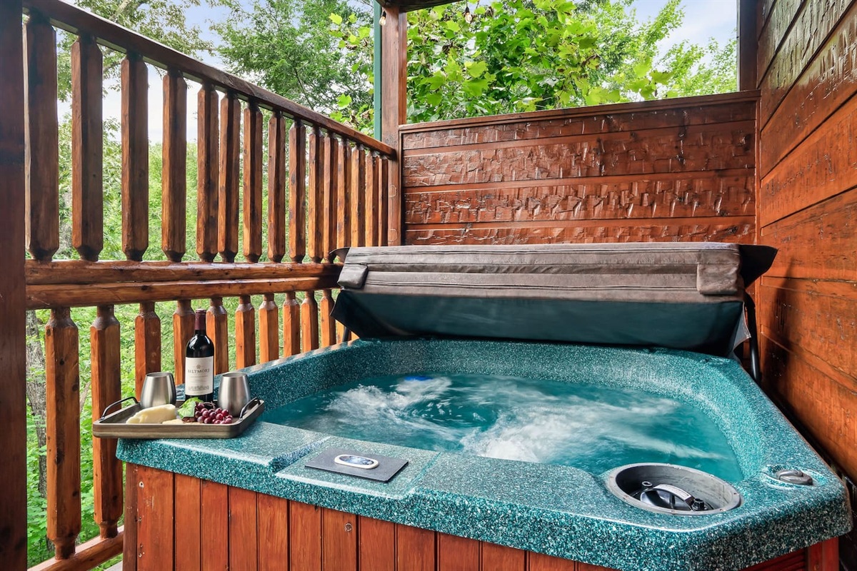 Turn off your brain & relax in the private hot tub with a view off the lower level porch!
