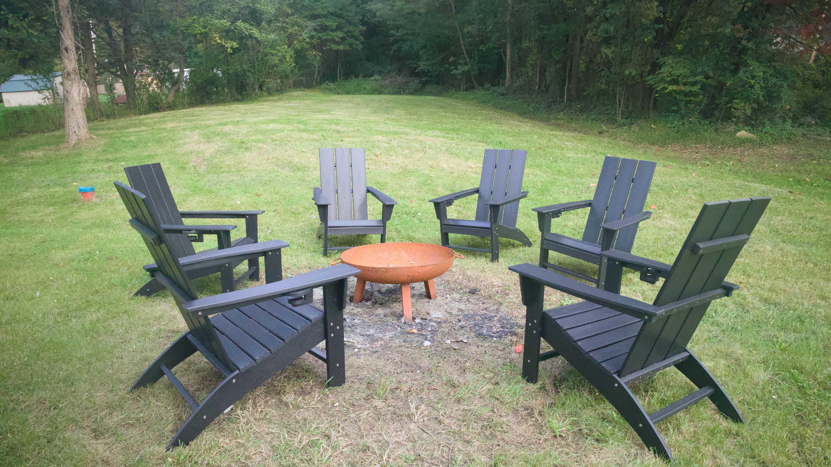 Firepit area, just off the back porch/driveway