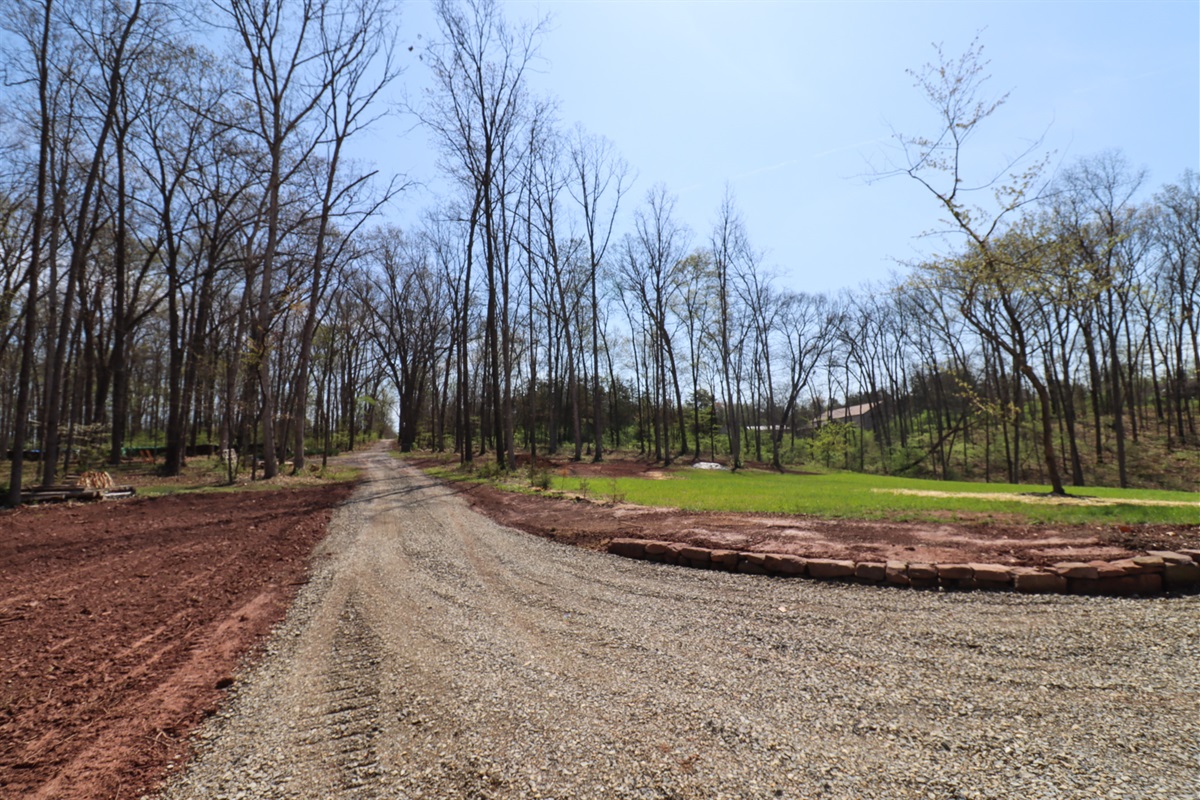 Private driveway tucked back a long lane in the woods