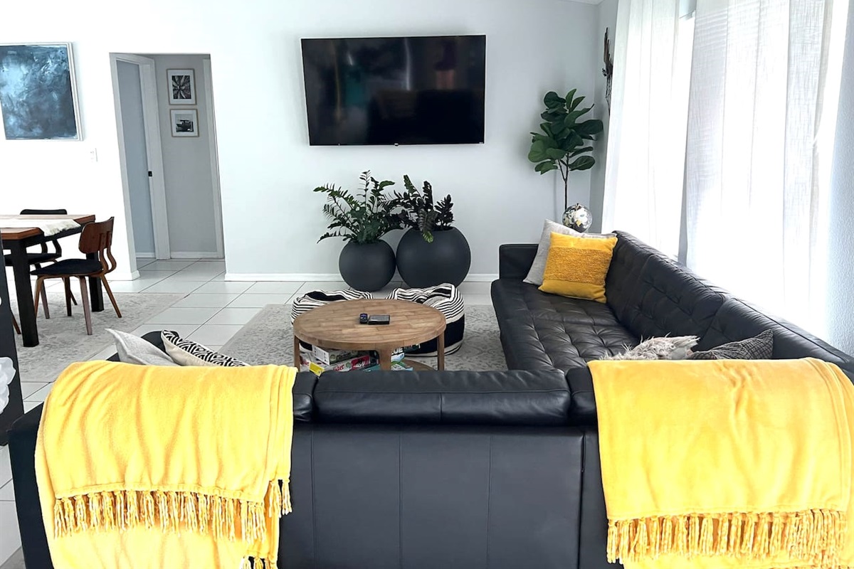 The space is tastefully decorated with modern artwork and accents