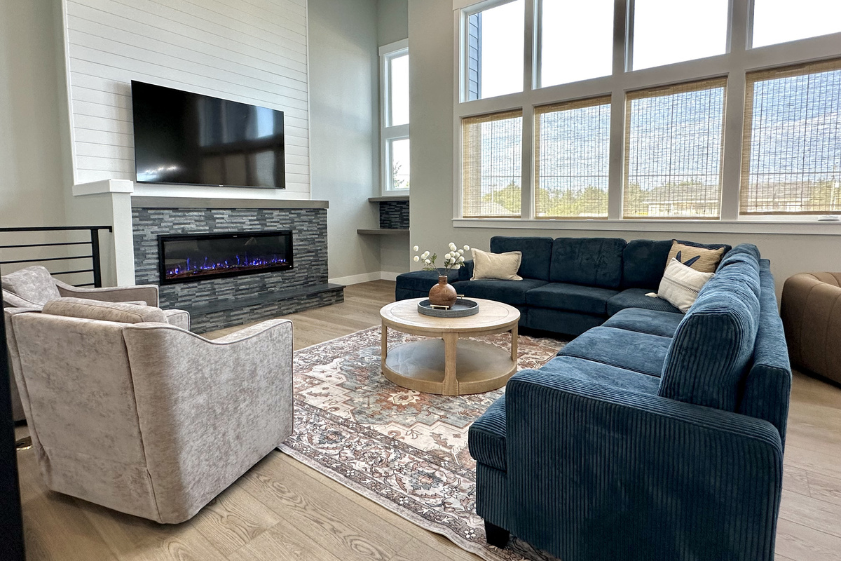 Let the daylight in from two full walls of windows — Side B's living room feels twice its size before anyone's even turned a lamp on.
