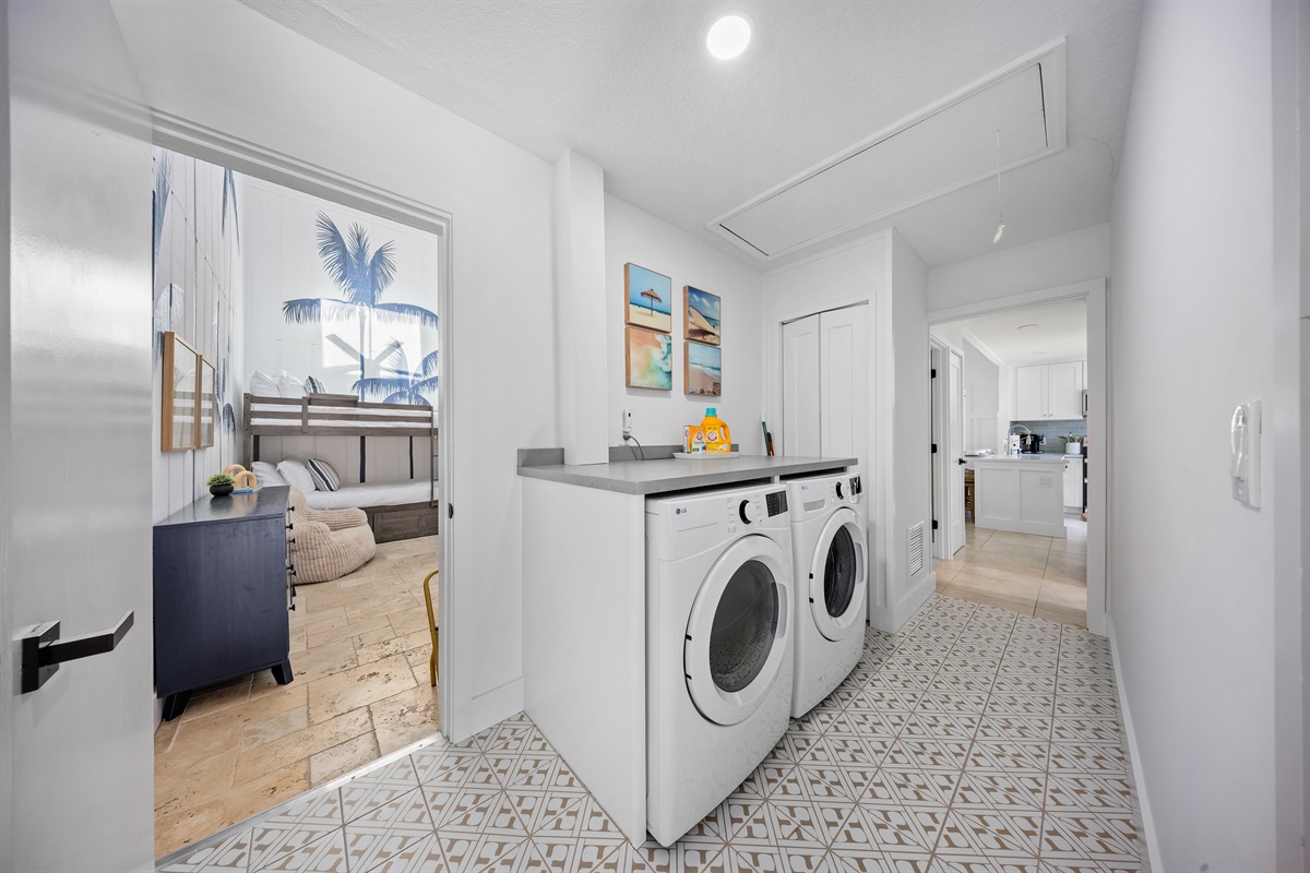 Bright, spacious, and thoughtfully designed ✨
A full laundry room with modern appliances and coastal touches &mdash; perfect for beach days, long stays, and effortless travel.